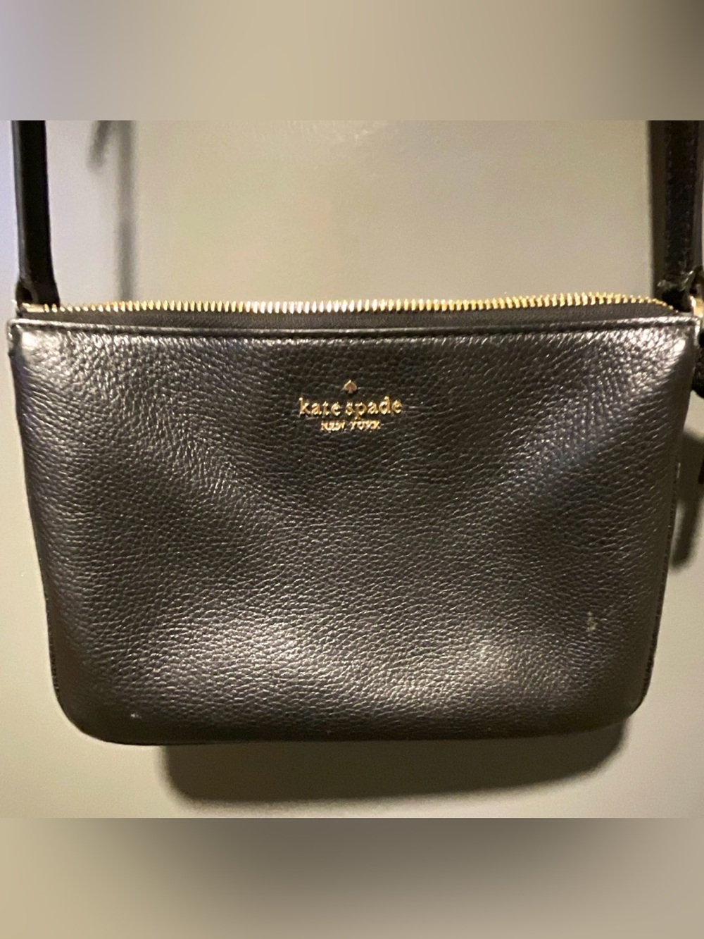 kate spade black leather cosmetic pouch with gold logo
